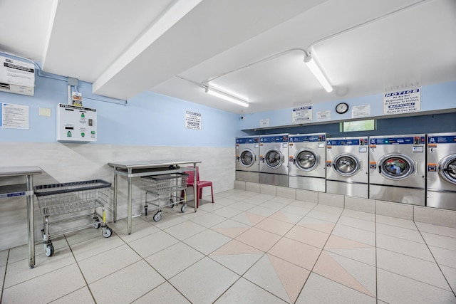 70-07 E Park Dr Unit A, Kew Garden Hills, NY 11367 - communal laundry room featuring washing machine and dryer