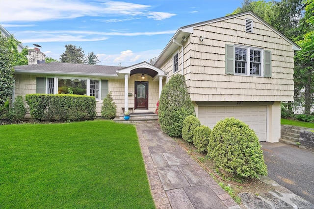 287 Old Army Rd, Scarsdale, NY 10583 - view of front facade featuring an attached garage, a front yard, asphalt driveway, and a chimney