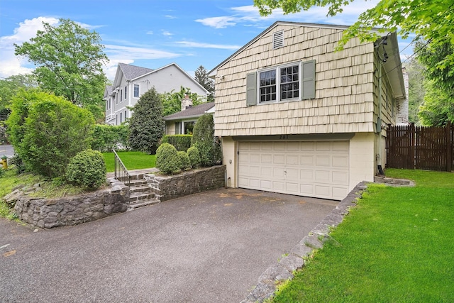 287 Old Army Rd, Scarsdale, NY 10583 - view of front of house featuring driveway and a garage