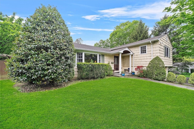 287 Old Army Rd, Scarsdale, NY 10583 - tri-level home with a front lawn and a shingled roof