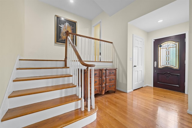 287 Old Army Rd, Scarsdale, NY 10583 - foyer with stairs, wood finished floors, baseboards, and recessed lighting