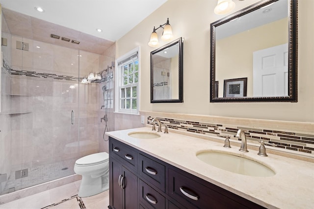 287 Old Army Rd, Scarsdale, NY 10583 - full bath with a shower stall, double vanity, toilet, tile patterned flooring, and backsplash