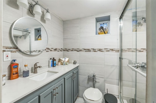 84-17 25th Ave, East Elmhurst, NY 11370 - full bathroom with toilet, vanity, tile walls, and a shower stall