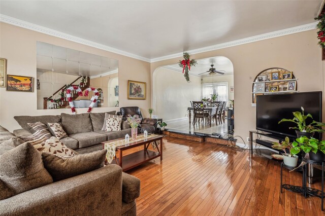 84-17 25th Ave, East Elmhurst, NY 11370 - living room with arched walkways, ceiling fan, hardwood / wood-style flooring, and ornamental molding