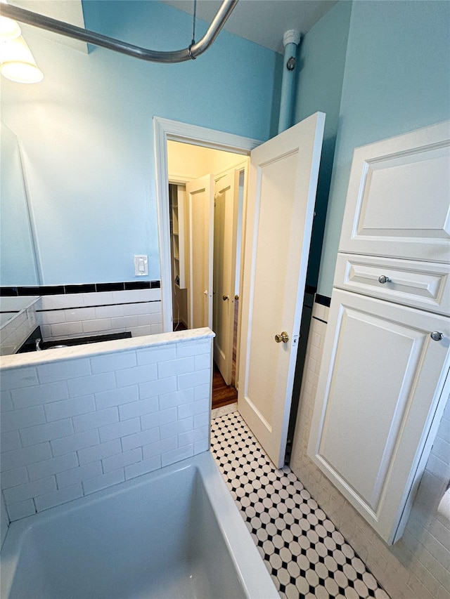 full bath with a bath