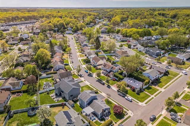 26 Forte Ave, Old Bethpage, NY 11804 - aerial perspective of suburban area with a heavily wooded area