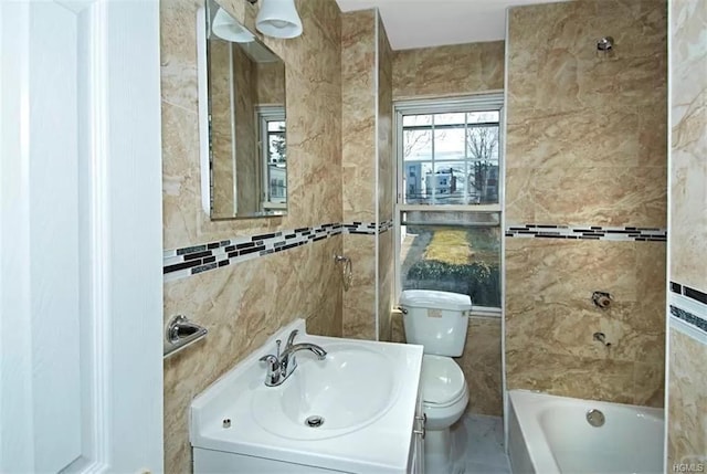 4565 Matilda Ave, Bronx, NY 10470 - bathroom featuring toilet, tile walls, and vanity