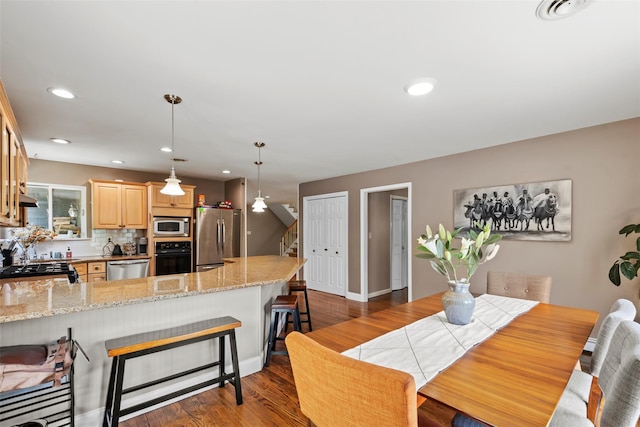 10 Spectrum Dr, Chester, NY 10918 - dining space with wood finished floors, recessed lighting, and baseboards