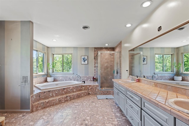 10 Spectrum Dr, Chester, NY 10918 - bathroom with a garden tub, a shower stall, double vanity, and recessed lighting