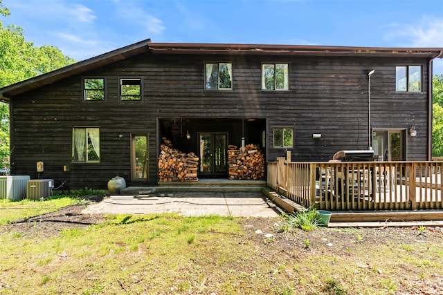 10 Spectrum Dr, Chester, NY 10918 - rear view of house with french doors, a deck, and central air condition unit
