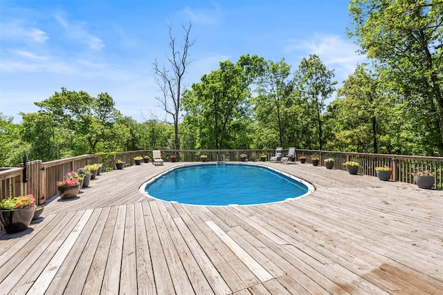 10 Spectrum Dr, Chester, NY 10918 - swimming pool featuring a deck and view of scattered trees