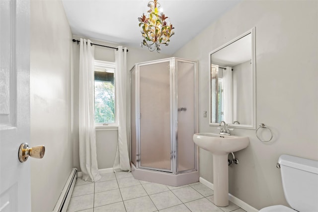 10 Spectrum Dr, Chester, NY 10918 - full bath featuring a stall shower, baseboard heating, tile patterned floors, and baseboards