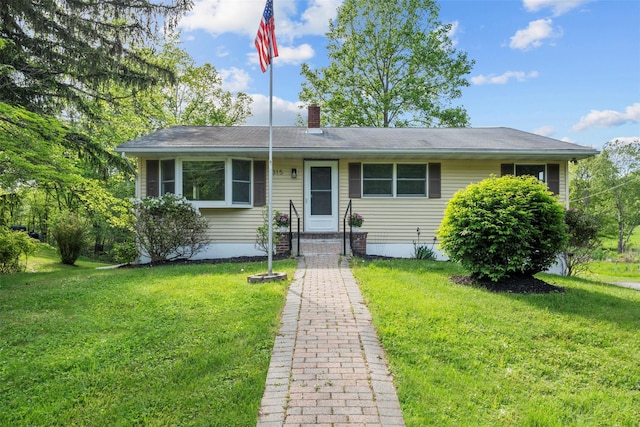 315 Scotchtown Rd, Goshen, NY 10924 - view of front of home featuring a front lawn and a chimney