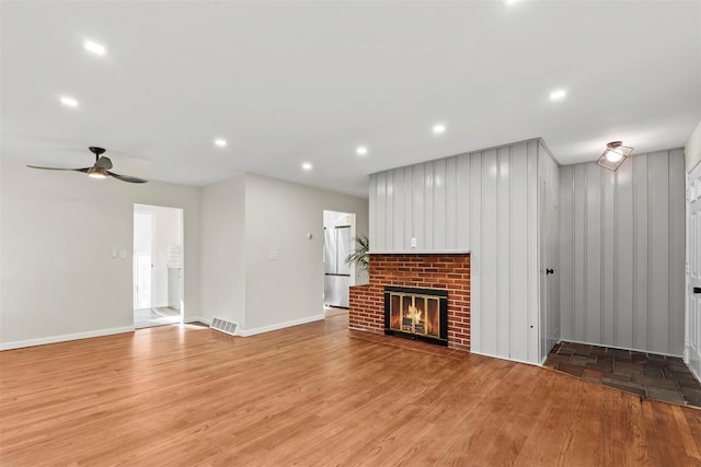 315 Scotchtown Rd, Goshen, NY 10924 - unfurnished living room featuring recessed lighting, light wood-type flooring, a ceiling fan, baseboards, and a fireplace