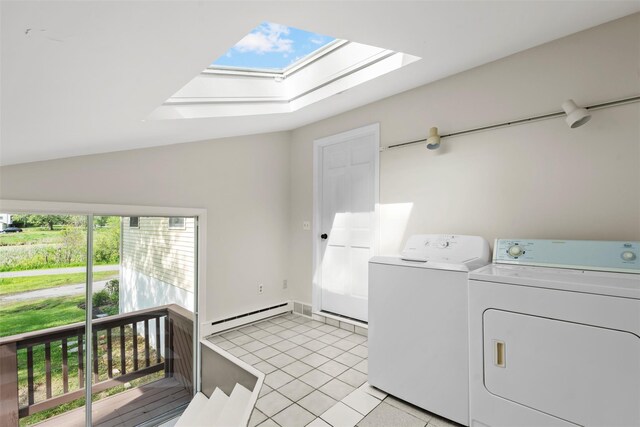 315 Scotchtown Rd, Goshen, NY 10924 - laundry room with baseboard heating, washer and dryer, a skylight, and light tile patterned floors