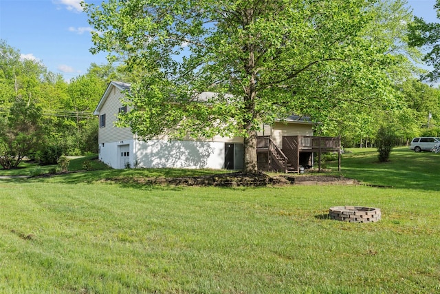 315 Scotchtown Rd, Goshen, NY 10924 - view of grassy yard with stairs, a deck, and an outdoor fire pit
