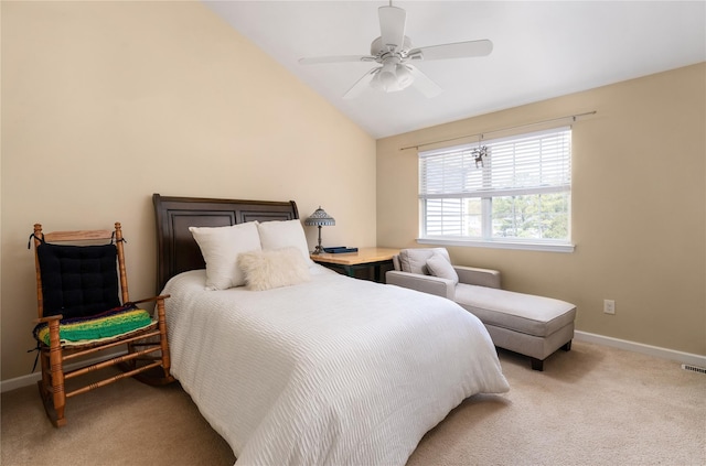 carpeted bedroom featuring vaulted ceiling, baseboards, a ceiling fan, and visible vents