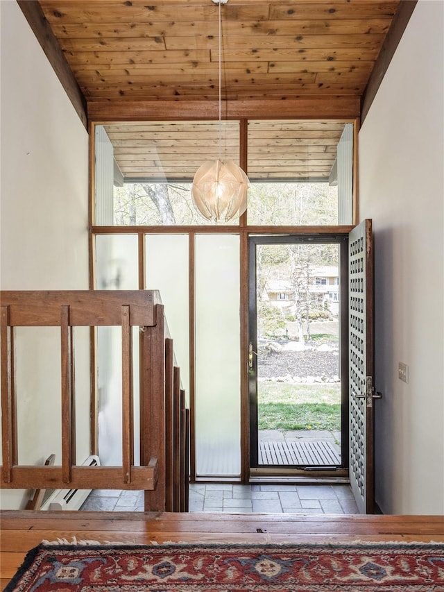 entryway featuring healthy amount of natural light and wood ceiling
