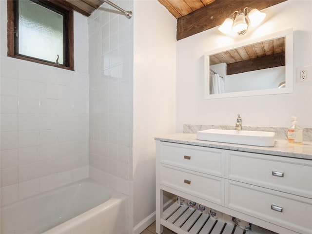 bathroom with vanity and shower / bath combo