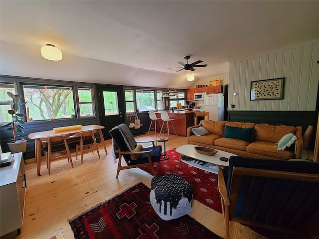 112 E Thompson Pl, Smallwood, NY 12778 - living area with light wood finished floors, ceiling fan, and lofted ceiling