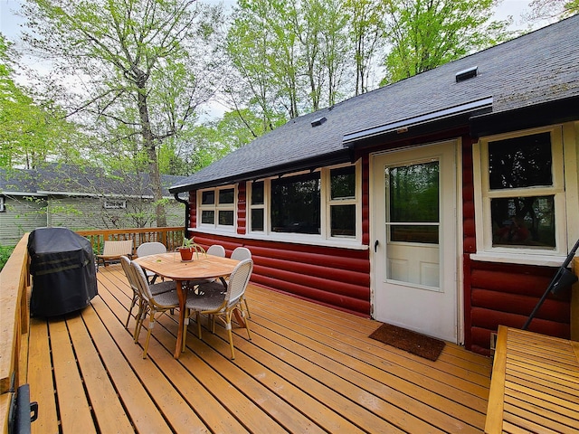 112 E Thompson Pl, Smallwood, NY 12778 - wooden terrace with outdoor dining space and a grill