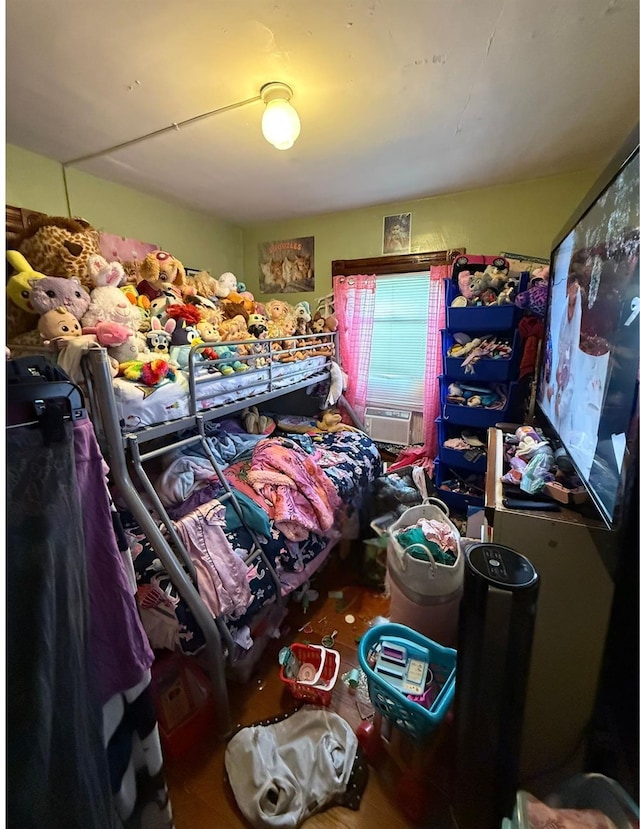 bedroom featuring cooling unit