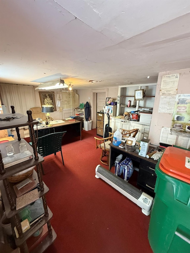 misc room featuring carpet and a workshop area