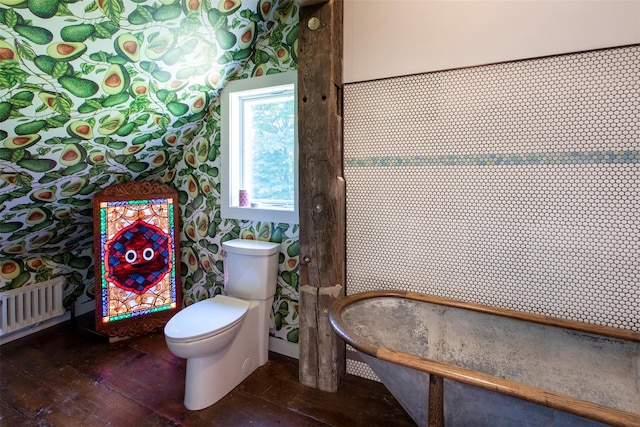 5 Downer Ln, Woodstock, NY 12498 - full bathroom with toilet, a freestanding tub, and hardwood / wood-style flooring