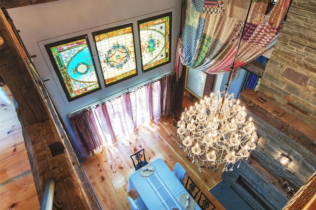 5 Downer Ln, Woodstock, NY 12498 - details with an inviting chandelier and wood finished floors