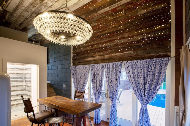 5 Downer Ln, Woodstock, NY 12498 - dining space with a notable chandelier and wood finished floors