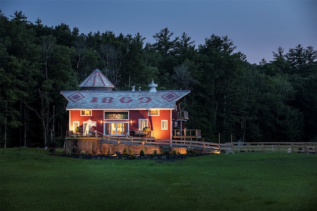 5 Downer Ln, Woodstock, NY 12498 - rear view of house featuring a yard, a chimney, a wooded view, and fence