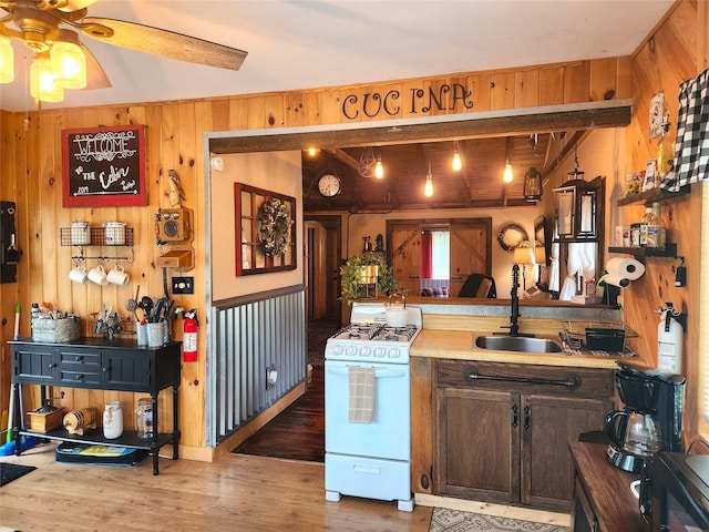 51 E Oak St, Smallwood, NY 12778 - kitchen featuring white gas range oven, ceiling fan, light wood-type flooring, a sink, and light countertops