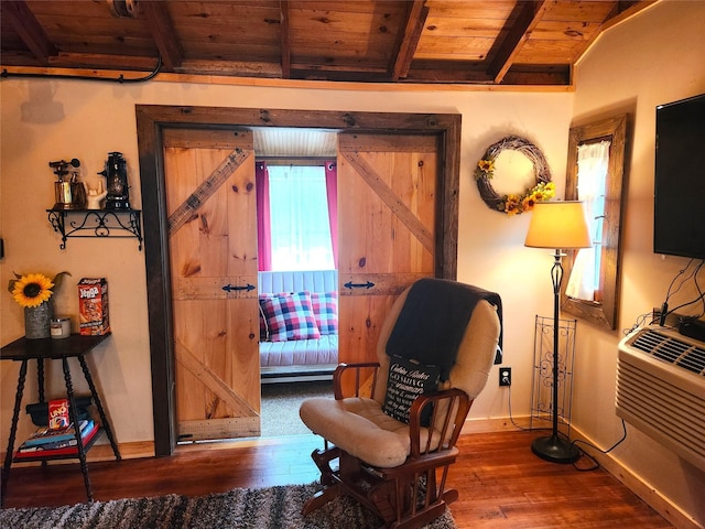 51 E Oak St, Smallwood, NY 12778 - living area featuring wooden ceiling, wood finished floors, baseboards, and an AC wall unit