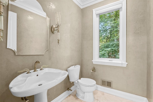 9 Oak Ridge Ct, West Harrison, NY 10604 - bathroom with a sink, ornamental molding, toilet, and baseboards