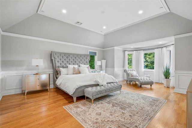 9 Oak Ridge Ct, West Harrison, NY 10604 - bedroom with lofted ceiling, a decorative wall, a wainscoted wall, light wood finished floors, and crown molding