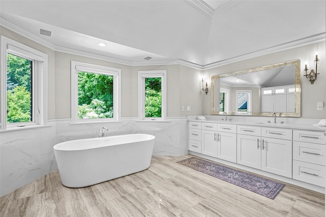 9 Oak Ridge Ct, West Harrison, NY 10604 - full bathroom featuring double vanity, a soaking tub, tile walls, ornamental molding, and a wainscoted wall