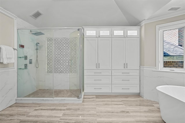 9 Oak Ridge Ct, West Harrison, NY 10604 - bathroom featuring lofted ceiling, a marble finish shower, and a freestanding tub