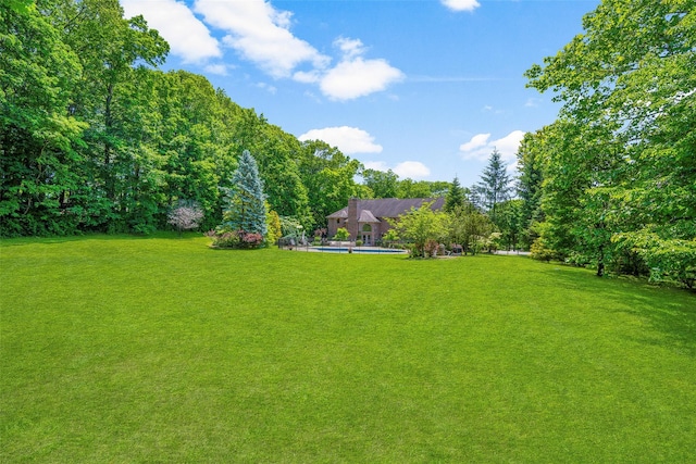 9 Oak Ridge Ct, West Harrison, NY 10604 - view of green lawn featuring an outdoor pool