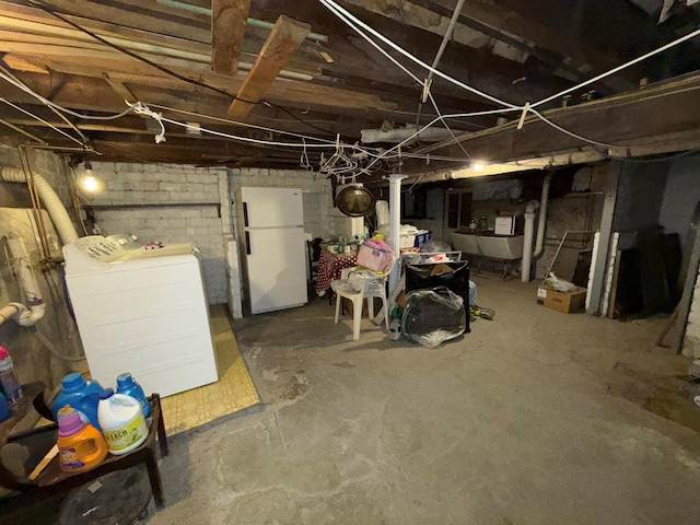 17 Springside Ave, Poughkeepsie, NY 12603 - unfinished basement featuring freestanding refrigerator and washer and clothes dryer