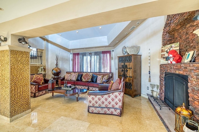 959 S End Rd, Woodmere, NY 11598 - living room featuring a raised ceiling and a fireplace