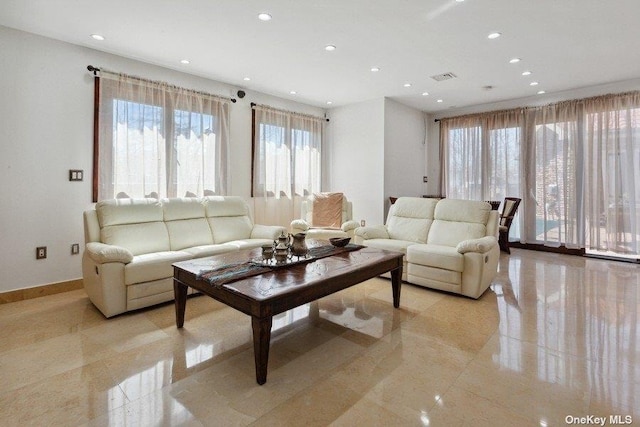 959 S End Rd, Woodmere, NY 11598 - living area with recessed lighting, baseboards, and light tile patterned floors