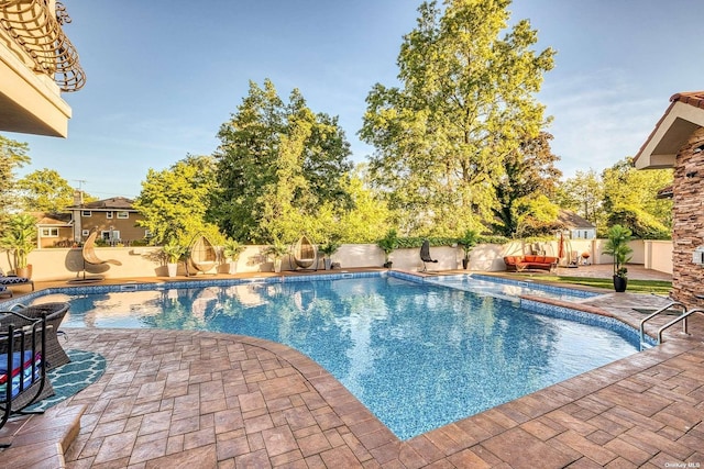 959 S End Rd, Woodmere, NY 11598 - view of swimming pool with a patio and a fenced backyard