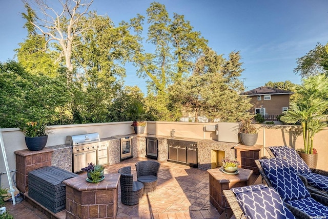 959 S End Rd, Woodmere, NY 11598 - view of patio featuring exterior kitchen, area for grilling, beverage cooler, and a sink