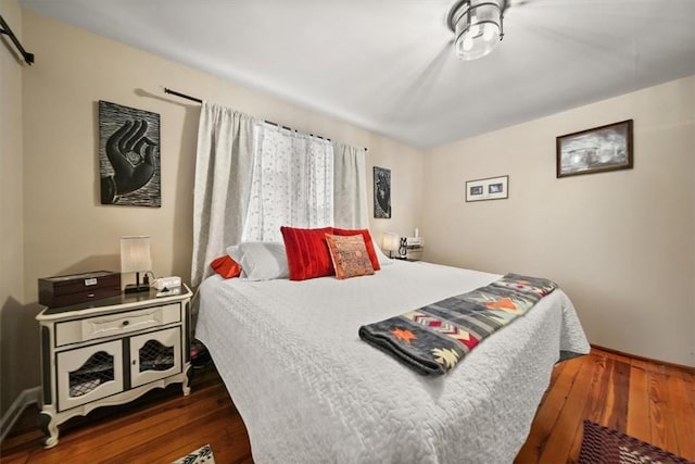 bedroom featuring hardwood / wood-style flooring