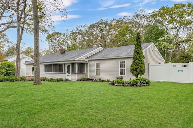 3 Russet Ln, Lake Grove, NY 11755 - ranch-style home featuring roof with shingles, fence, a front lawn, and a chimney