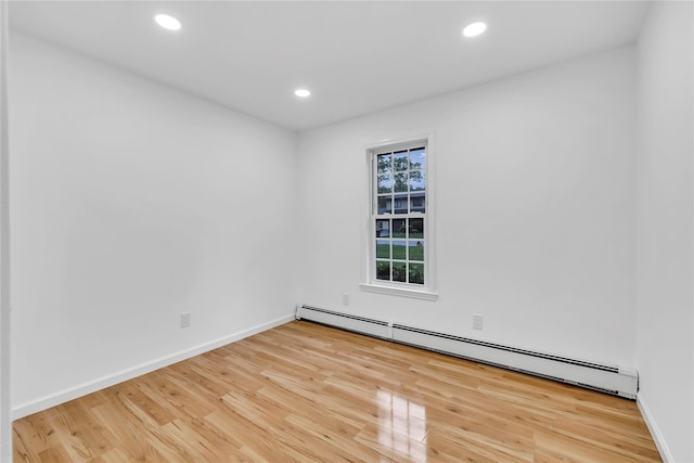 3 Russet Ln, Lake Grove, NY 11755 - unfurnished room featuring baseboards, a baseboard radiator, recessed lighting, and wood finished floors