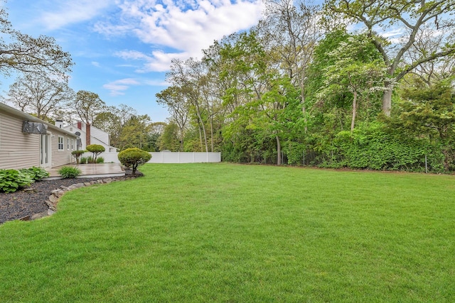 3 Russet Ln, Lake Grove, NY 11755 - view of yard with a patio area and fence