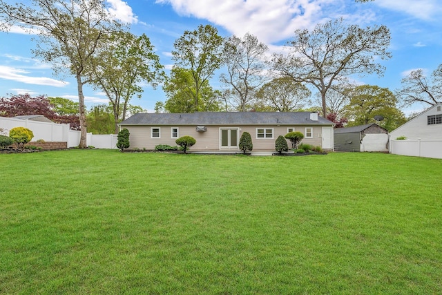 3 Russet Ln, Lake Grove, NY 11755 - back of house featuring a yard and a fenced backyard