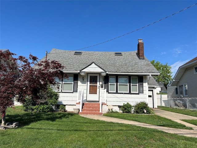 bungalow featuring roof with shingles, a chimney, entry steps, a garage, and concrete driveway