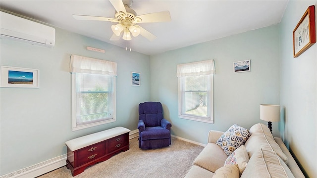 living area with a wall unit AC, baseboard heating, carpet floors, baseboards, and a ceiling fan
